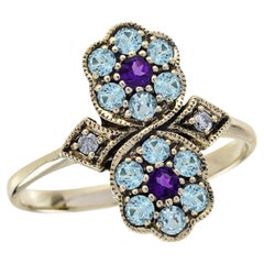 Bague florale de style vintage en or massif 9 carats, sertie d'une améthyste naturelle, d'une topaze bleue et d'un diamant