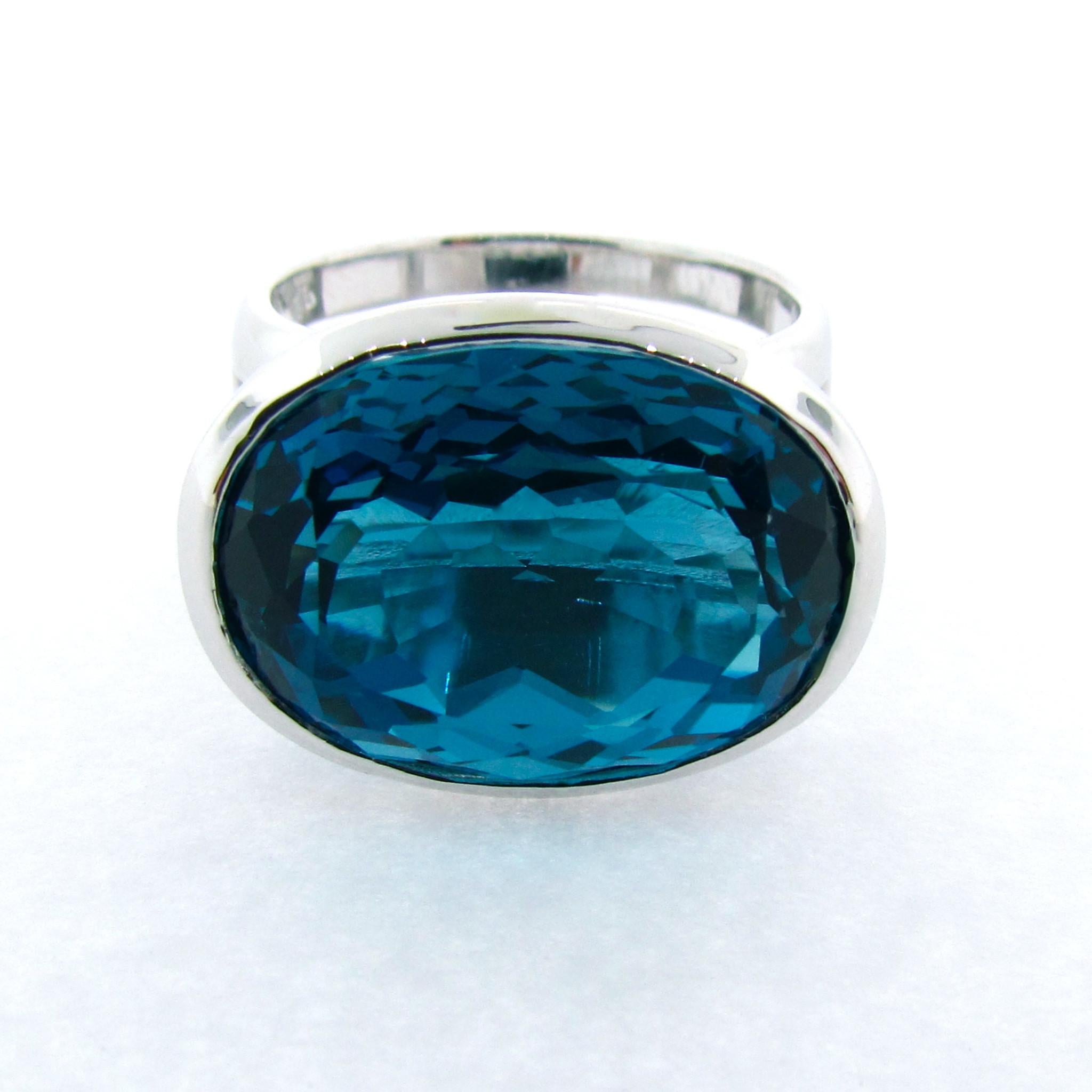 Oval Cut 9k White Gold London Blue Topaz Horizon Ring For Sale