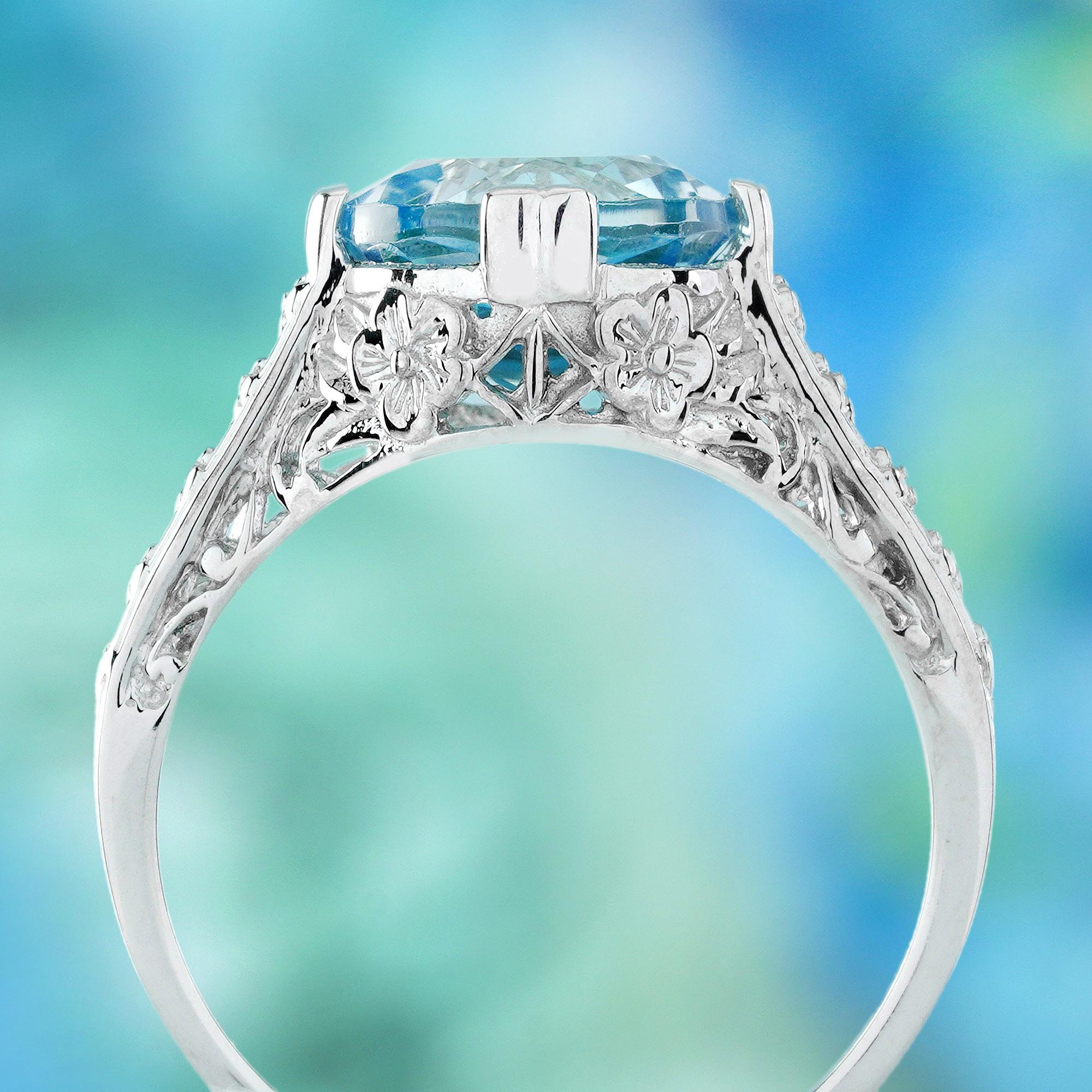 Anello in oro bianco 9K in stile solitario d'epoca con topazio blu rotondo naturale in filigrana In condizioni Nuovo in vendita a Bangkok, TH