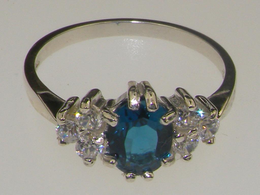 For Sale:  9k White Gold Oval Natural London Blue Topaz with Diamond Cluster Ring 4