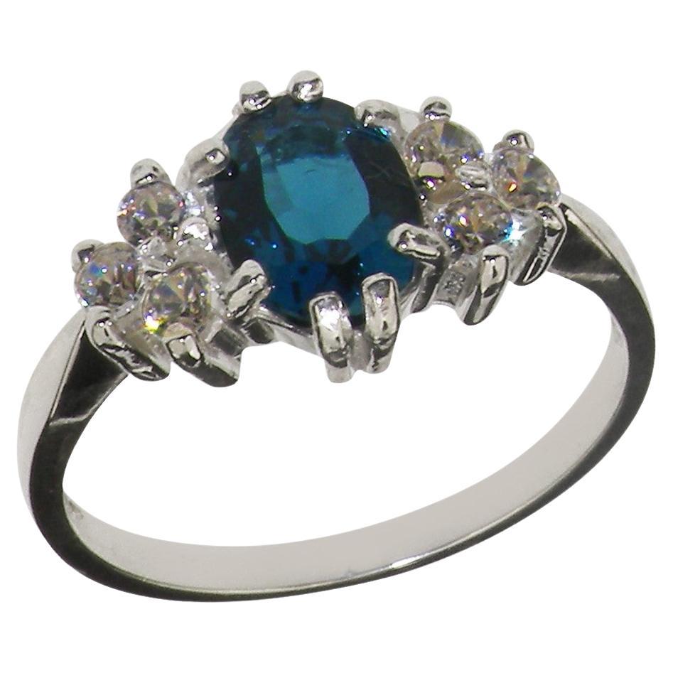 9k White Gold Oval Natural London Blue Topaz with Diamond Cluster Ring