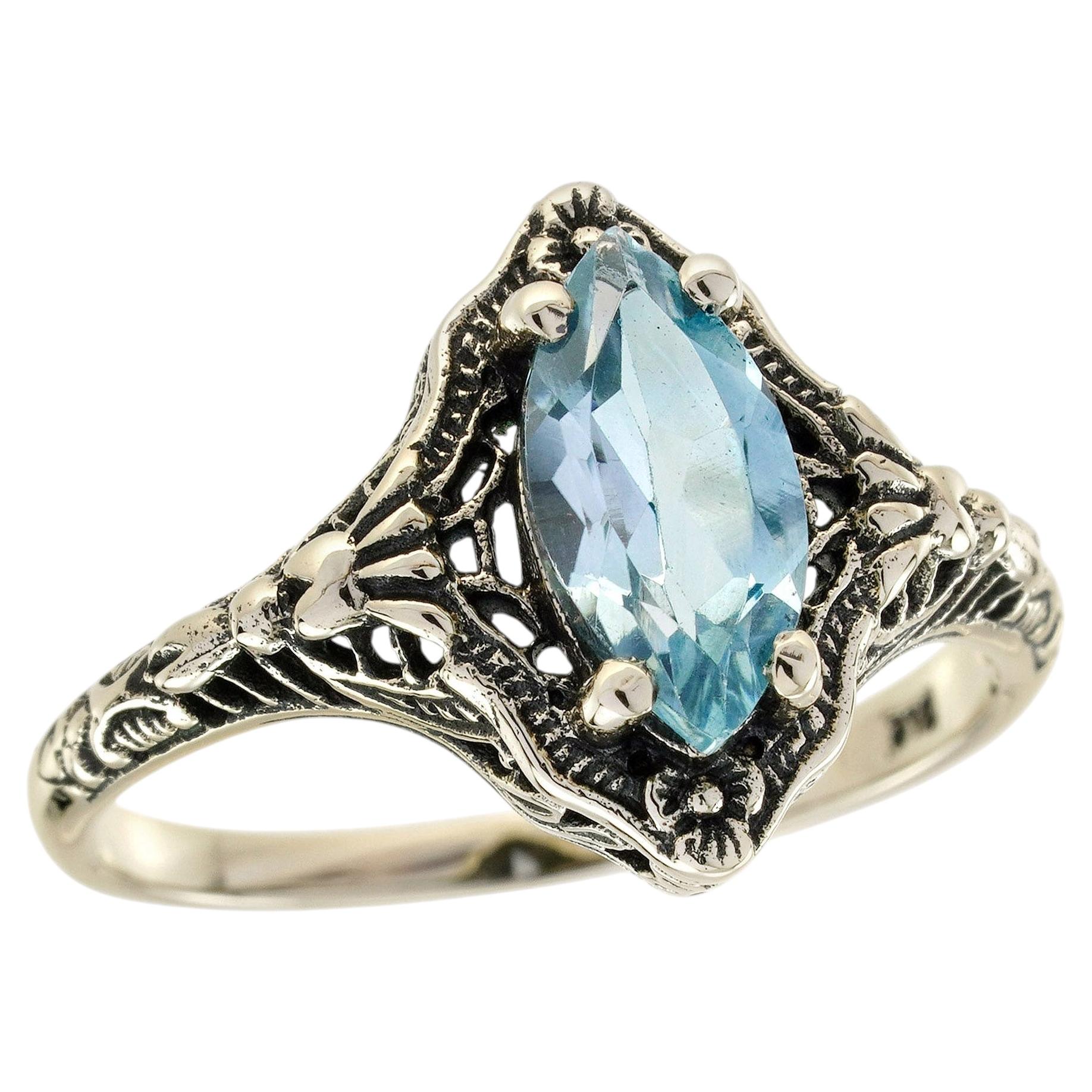 Bague filigrane en or blanc 9K massif avec topaze bleu ciel de style vintage