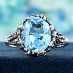 9K White Solid Gold Blue Topaz Vintage Style Floral Motif Ring
