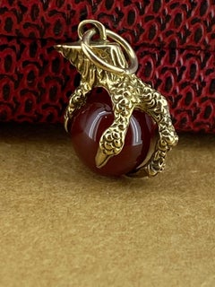 9K Yellow Gold 375 Dragon's Claw Carnelian Ball Charm. English Hallmarks