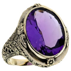 Bague cocktail en or jaune 9K à l
améthyste de style vintage