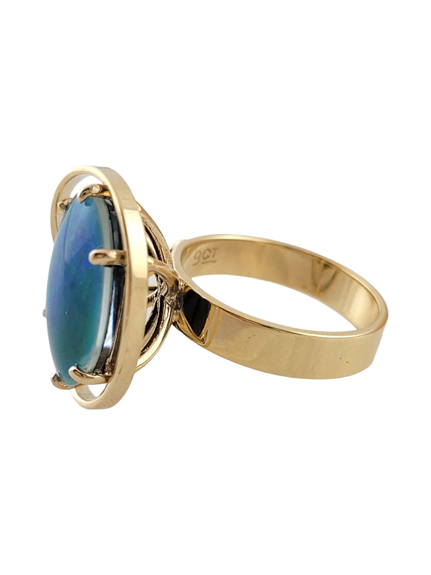 This gorgeous 9K yellow gold ring has a beautiful black opal triplet stone!

Black opal triplet is slightly included with play of color. Blue - green multicolor and good cut.

Ring size: 6.25-6.5

Shank: 4mm

Front: 19.6mm X 15.3mm X 109mm

Weight: