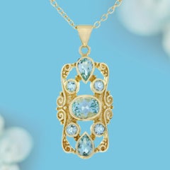 9K Yellow Gold Blue Topaz Victorian Style Pendant