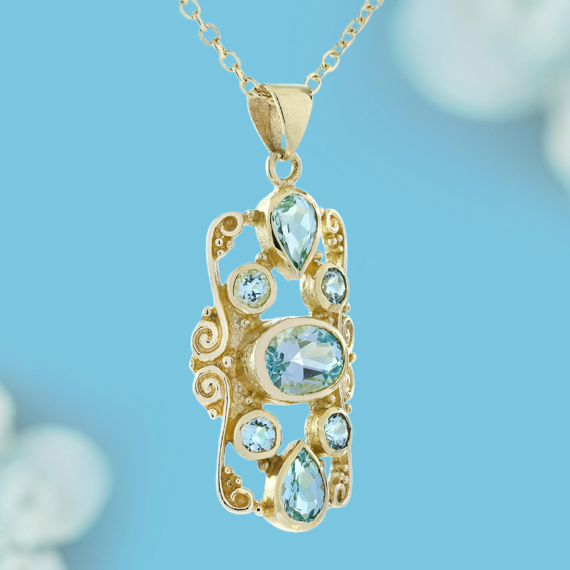 Victorien Pendentif de style victorien en or jaune 9K avec topaze bleue en vente