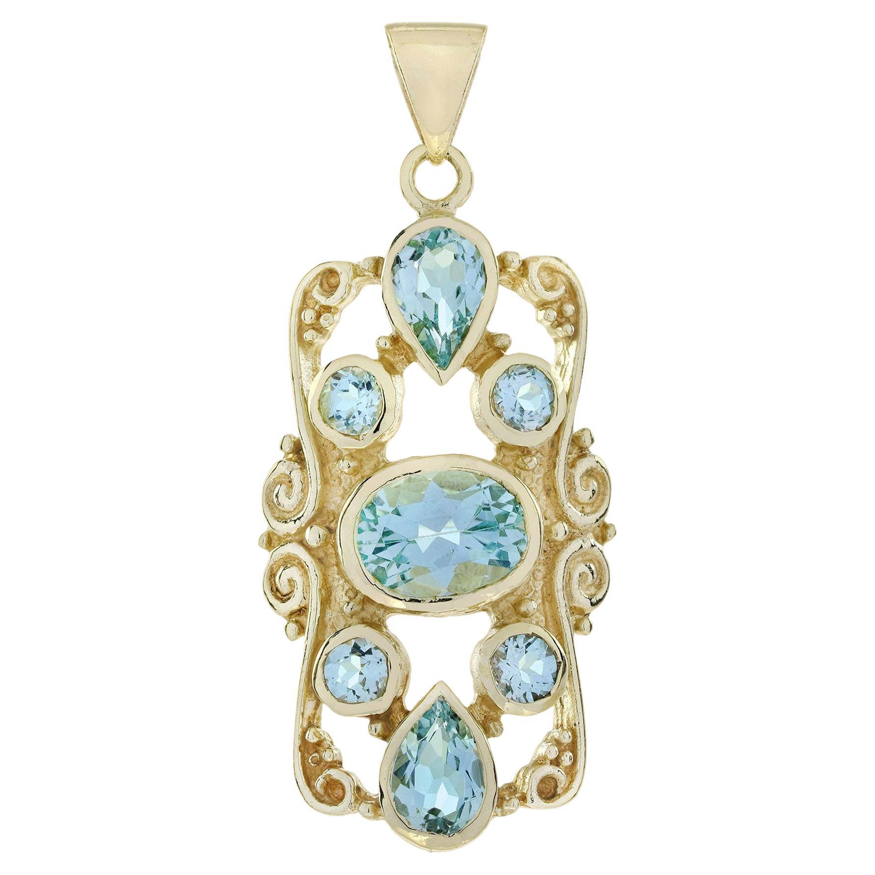 Pendentif de style victorien en or jaune 9K avec topaze bleue en vente