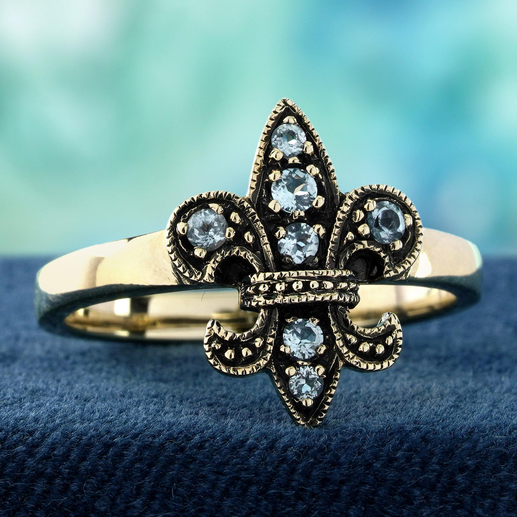 Edwardian 9K Yellow Gold Blue Topaz Vintage Style Fleur De Lis Ring For Sale