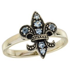 Bague Fleur de Lys en or jaune 9K Topaze Bleue Style Vintage