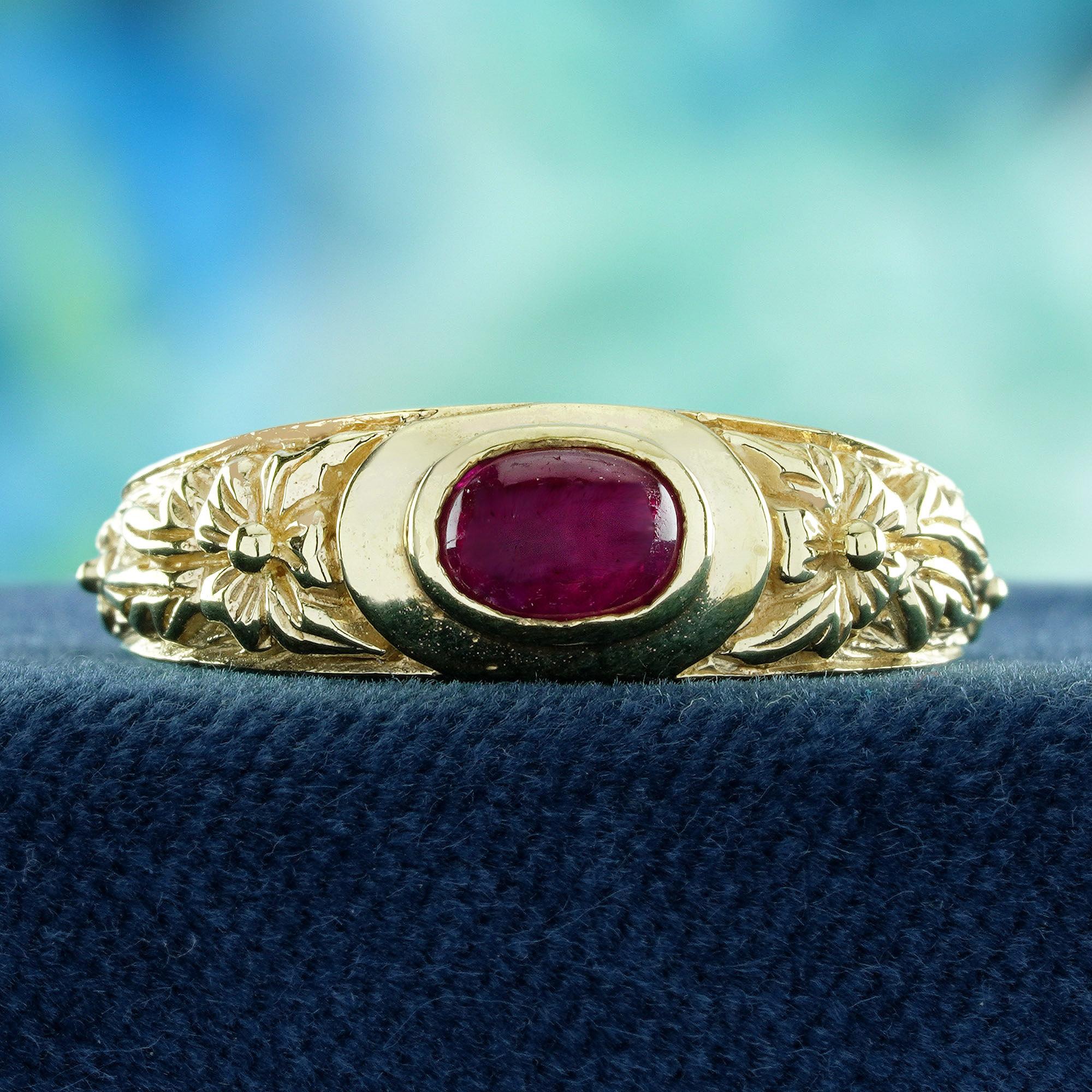 Add timeless elegance to your collection with this Cabochon Ruby Vintage-Style Floral Motif Band Ring. Featuring a smooth, glowing ruby cabochon at the center, the ring exudes warmth and passion with its deep red hue. Delicate vintage-inspired