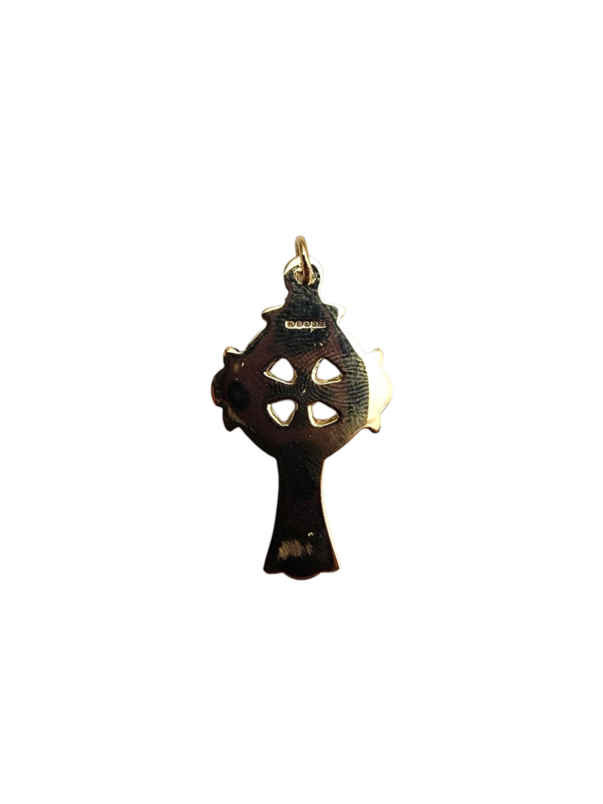 9K Yellow Gold Celtic Cross Pendant -

This 9K yellow gold Celtic cross charm features intricate detailing that reflects ancient tradition and spiritual heritage. With its warm, polished finish and timeless design, it’s a meaningful symbol of faith