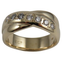 Anello Eternity Cross Over con diamante in oro giallo 9k
