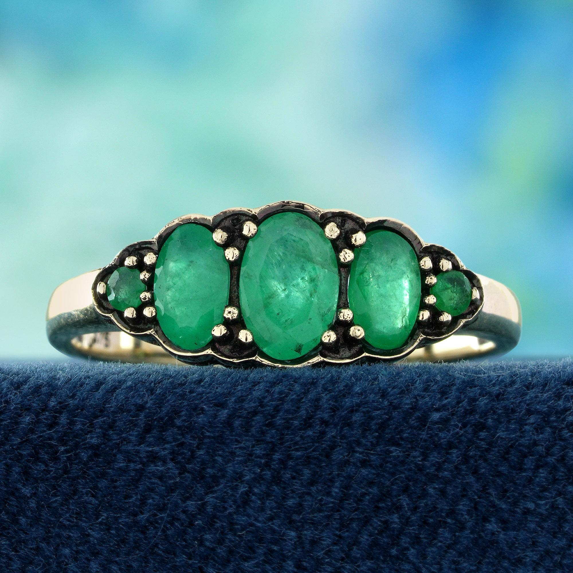 This vintage-style ring showcases vivid emeralds set in elegant prongs — allowing its natural green brilliance to shine from every angle. The classic setting highlights the stone’s regal beauty while vintage-inspired details add a touch of old-world