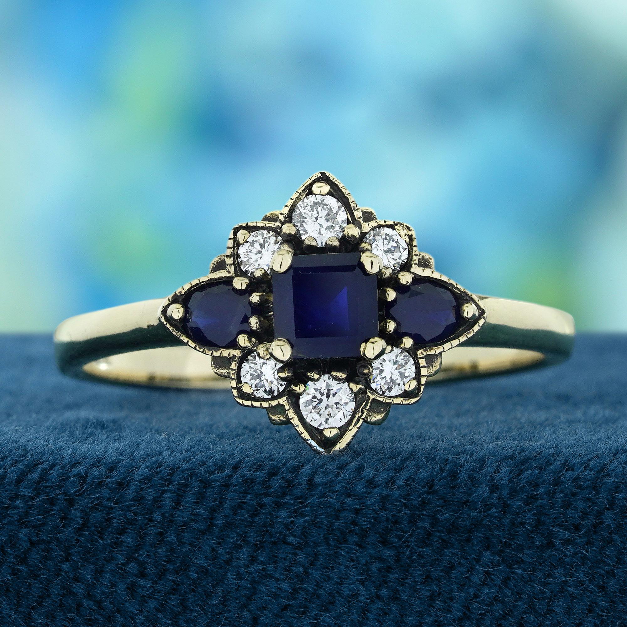 At its heart lies a striking square-cut blue sapphire, exuding depth and royalty. Flanked on the sides by two smaller sapphires, the design draws the eye with perfect symmetry and balance. The top and bottom are delicately accented with lustrous