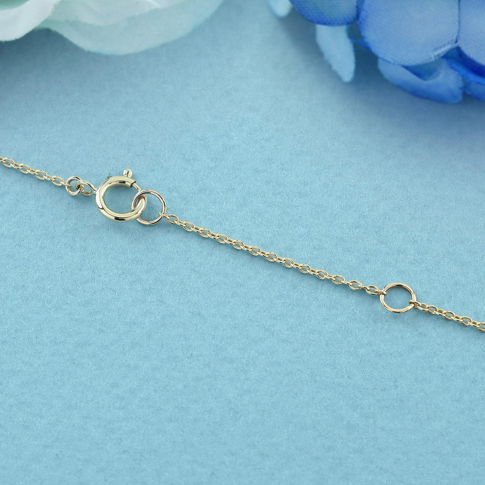 Collier en or jaune 9K avec perles et saphirs bleus naturels et nœuds de ruban de style vintage en vente 1