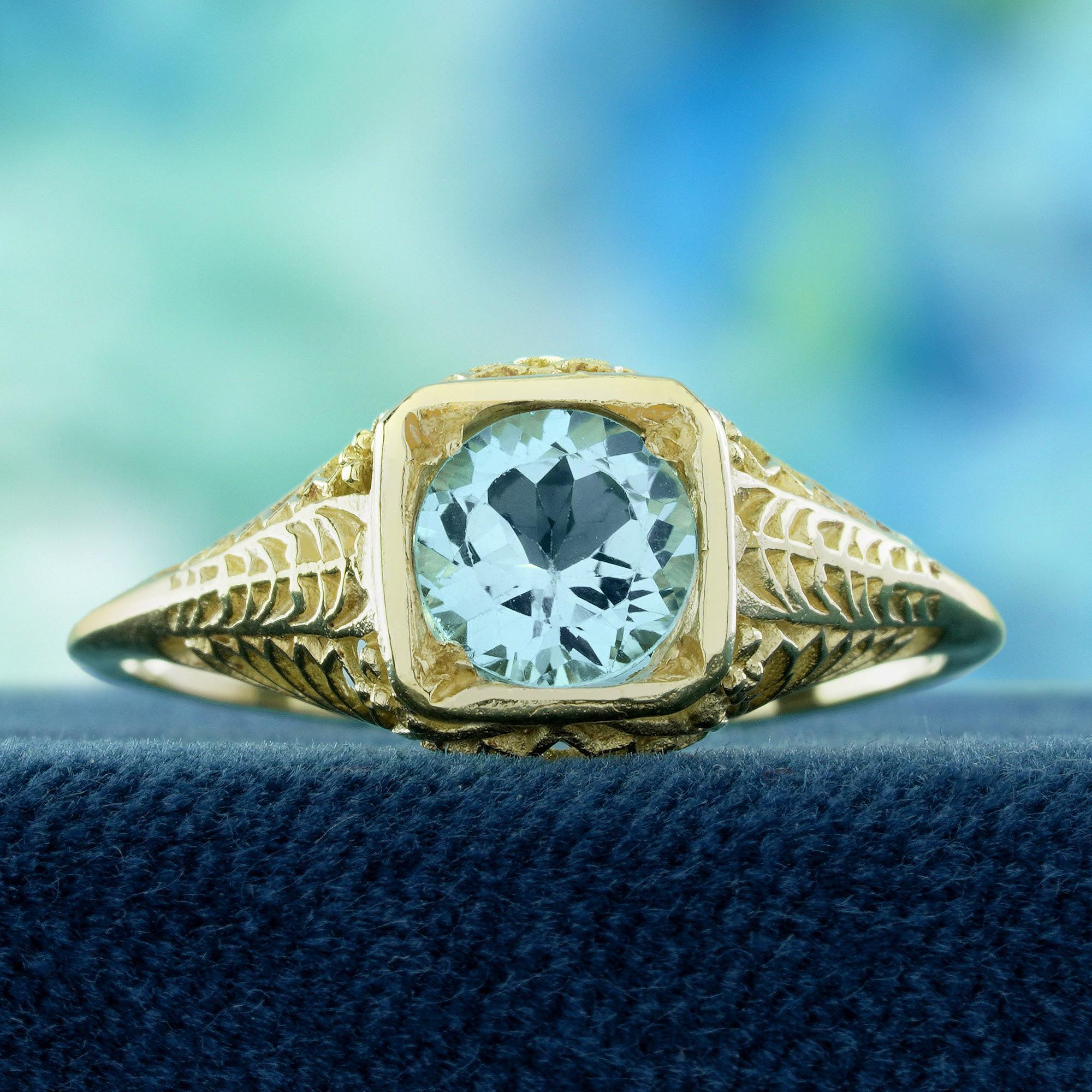 Fangen Sie zeitlose Schönheit ein mit diesem filigranen Ring aus natürlichem Blautopas im Vintage-Stil. In der Mitte leuchtet ein strahlender, runder Blautopas, dessen lebendiger Farbton Ruhe und Klarheit ausstrahlt. Die Schultern sind mit einem