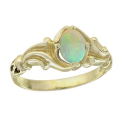 Anillo solitario estilo vintage de ópalo natural de oro amarillo de 9 quilates