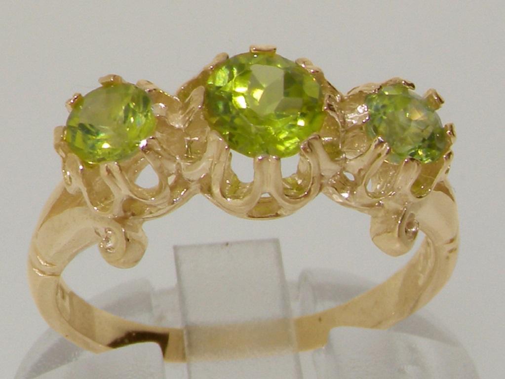 For Sale:  9K Yellow Gold Natural Peridot Fleur de Lys Carving Ring Customizable 3