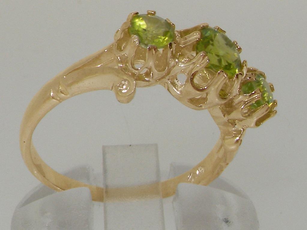 For Sale:  9K Yellow Gold Natural Peridot Fleur de Lys Carving Ring Customizable 4