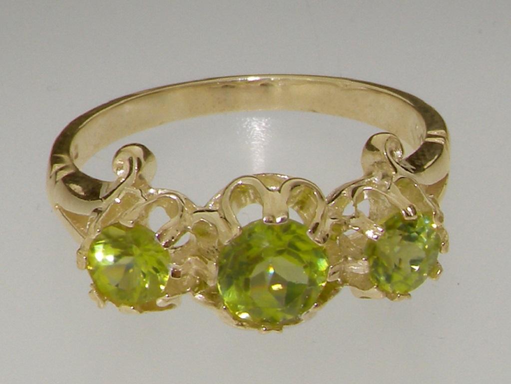 For Sale:  9K Yellow Gold Natural Peridot Fleur de Lys Carving Ring Customizable 6