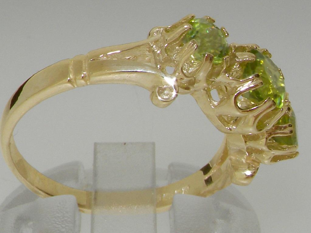 For Sale:  9K Yellow Gold Natural Peridot Fleur de Lys Carving Ring Customizable 7