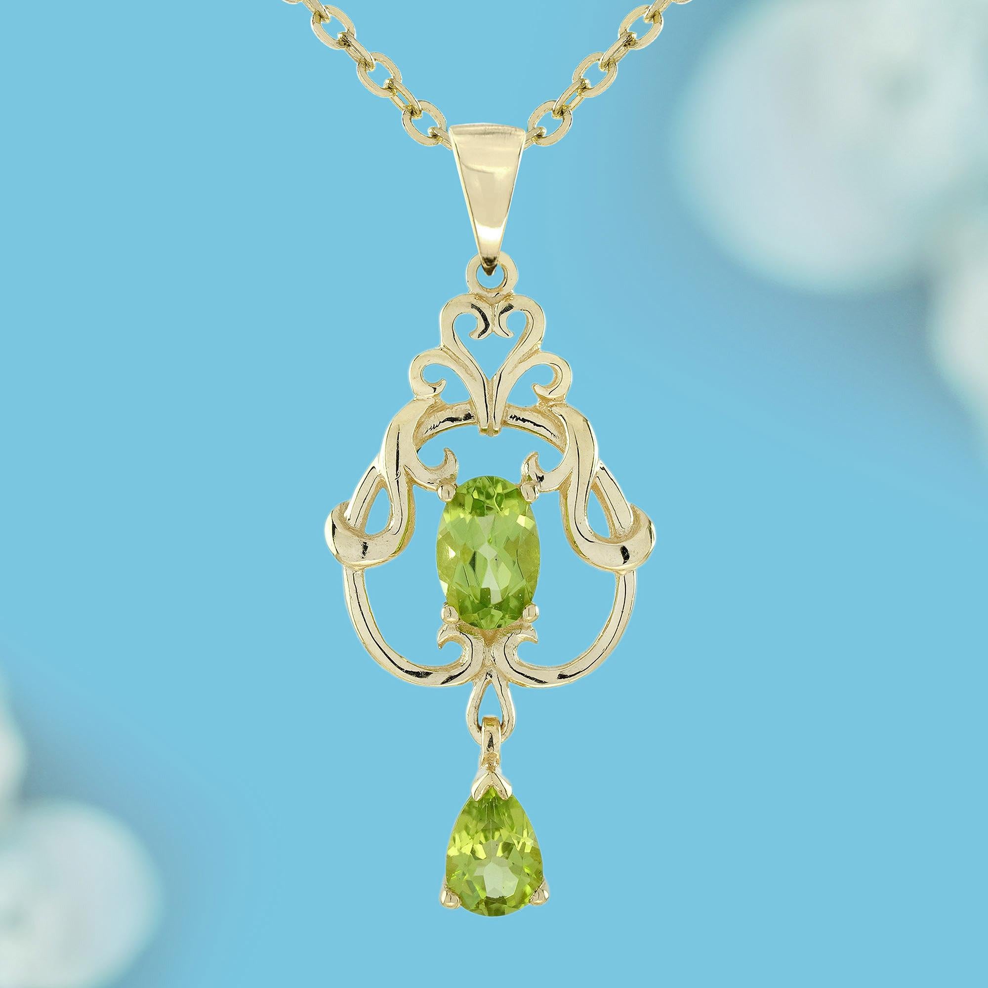 This natural peridot Victorian-style pendant exudes vintage elegance with a fresh, botanical charm. At its center, a vibrant oval peridot is prong-set within an intricate heart motif design, symbolizing love and friendship. Enhancing its grace, a