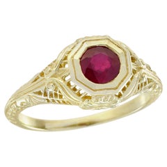 Anello in oro giallo 9K con rubino naturale in stile filigrana vintage