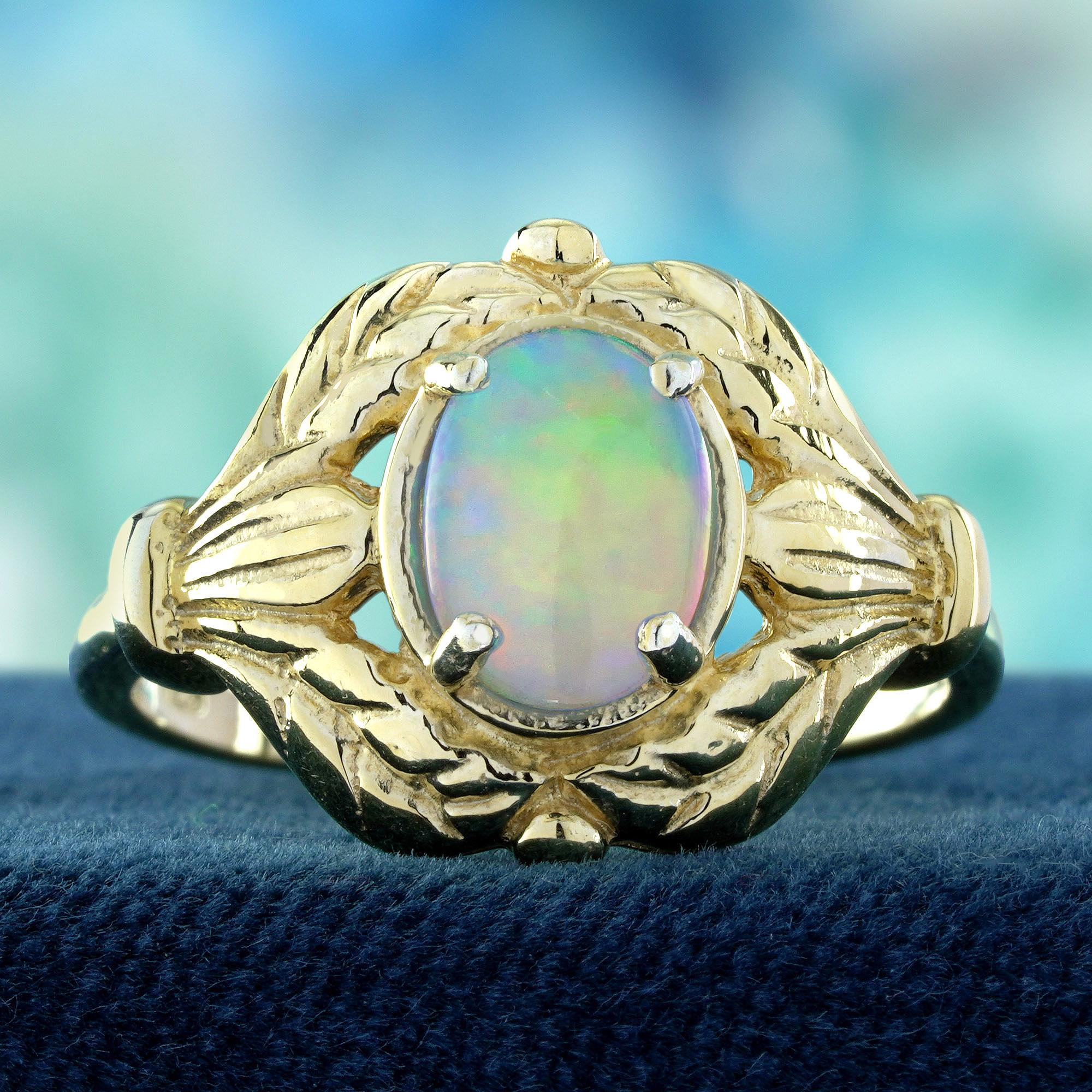 Découvrez une élégance enchanteresse avec cette bague cocktail ovale opale de style vintage. L'opale ovale lumineuse captive par ses couleurs changeantes et sa douce lueur, incarnant une beauté rêveuse et éthérée. Des détails d'inspiration Vintage