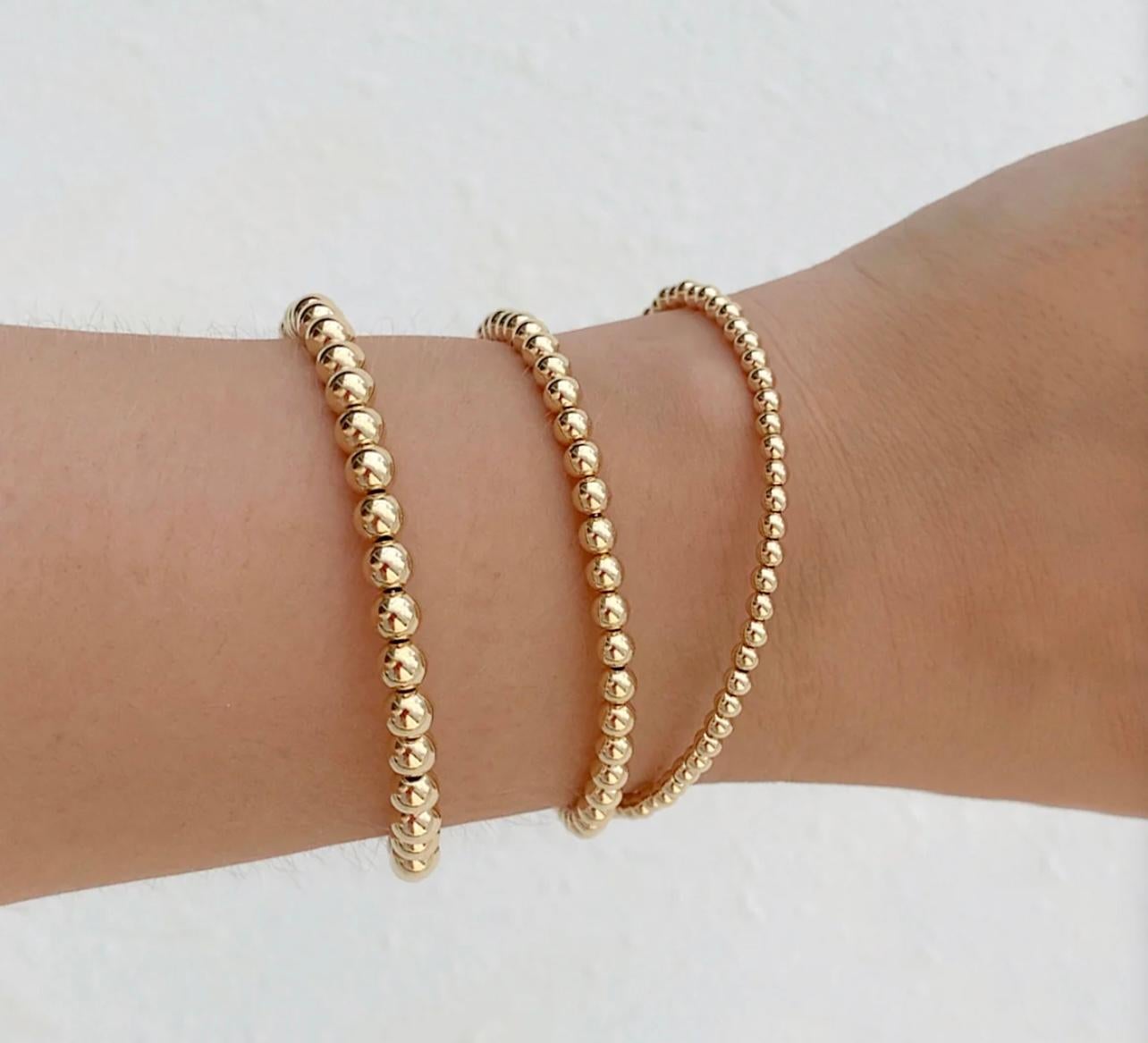 - 9K Yellow Gold Round Bead Bracelet In New Condition For Sale In London, GB