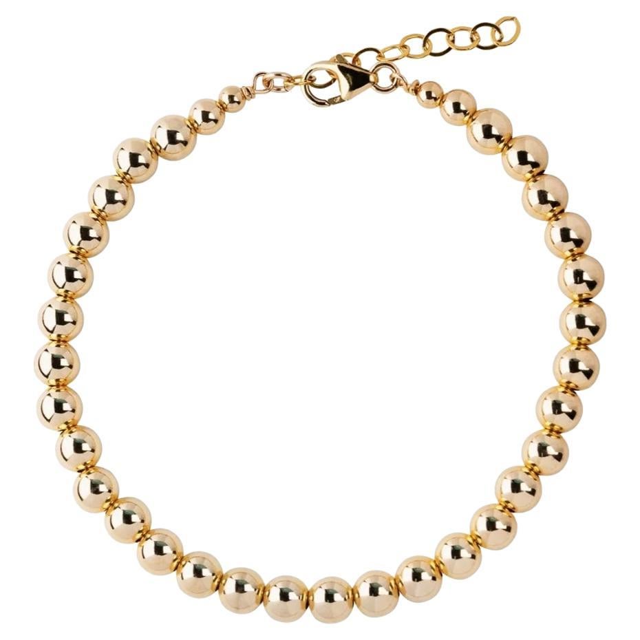 - 9K Yellow Gold Round Bead Bracelet