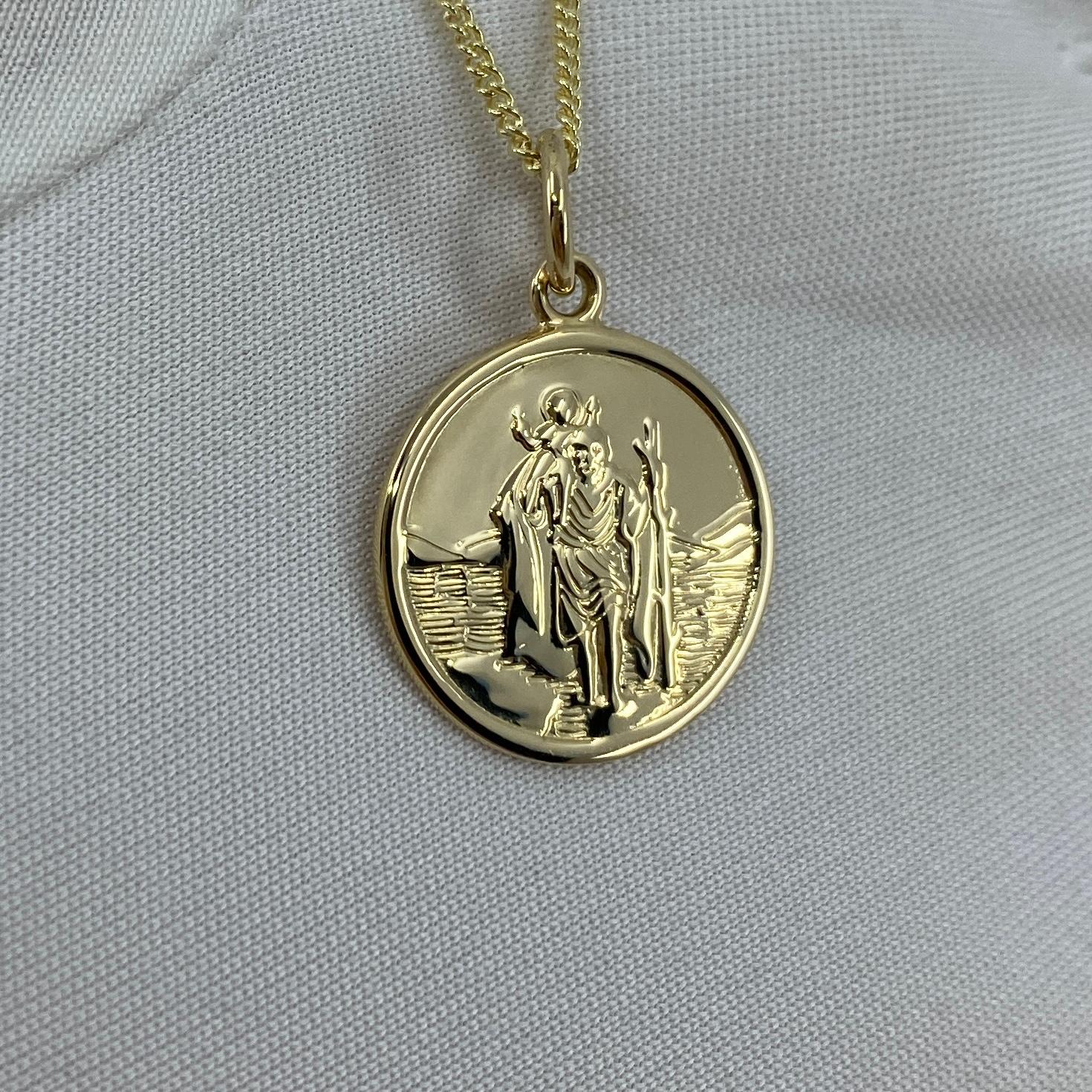 9k Yellow Gold Round St. Christopher Pendant Necklace.

Beautiful 16mm round St. Christopher pendant weighing 1.8g hanging on an 18' (45cm) curb chain.

The pendant has full UK hallmarks with the reverse blank allowing for engraving.

Brand new and