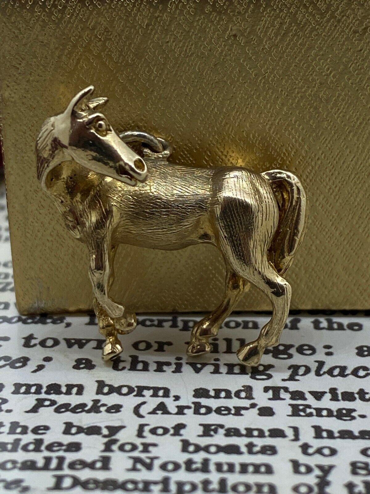 
Designed as a horse, 
meticulously crafted in 9K yellow gold, 

this charm is finely detailed, 
bearing G JL hallmark, 9ct 375 gold stamp & letter date

Dimensions: 26mm (without bail) x 26mm (in its widest part)
Total item's weight: 7.9gr. 

Circa