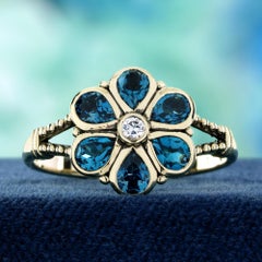 9K Yellow Gold White Sapphire and London Blue Topaz Vintage Style Floral Ring
