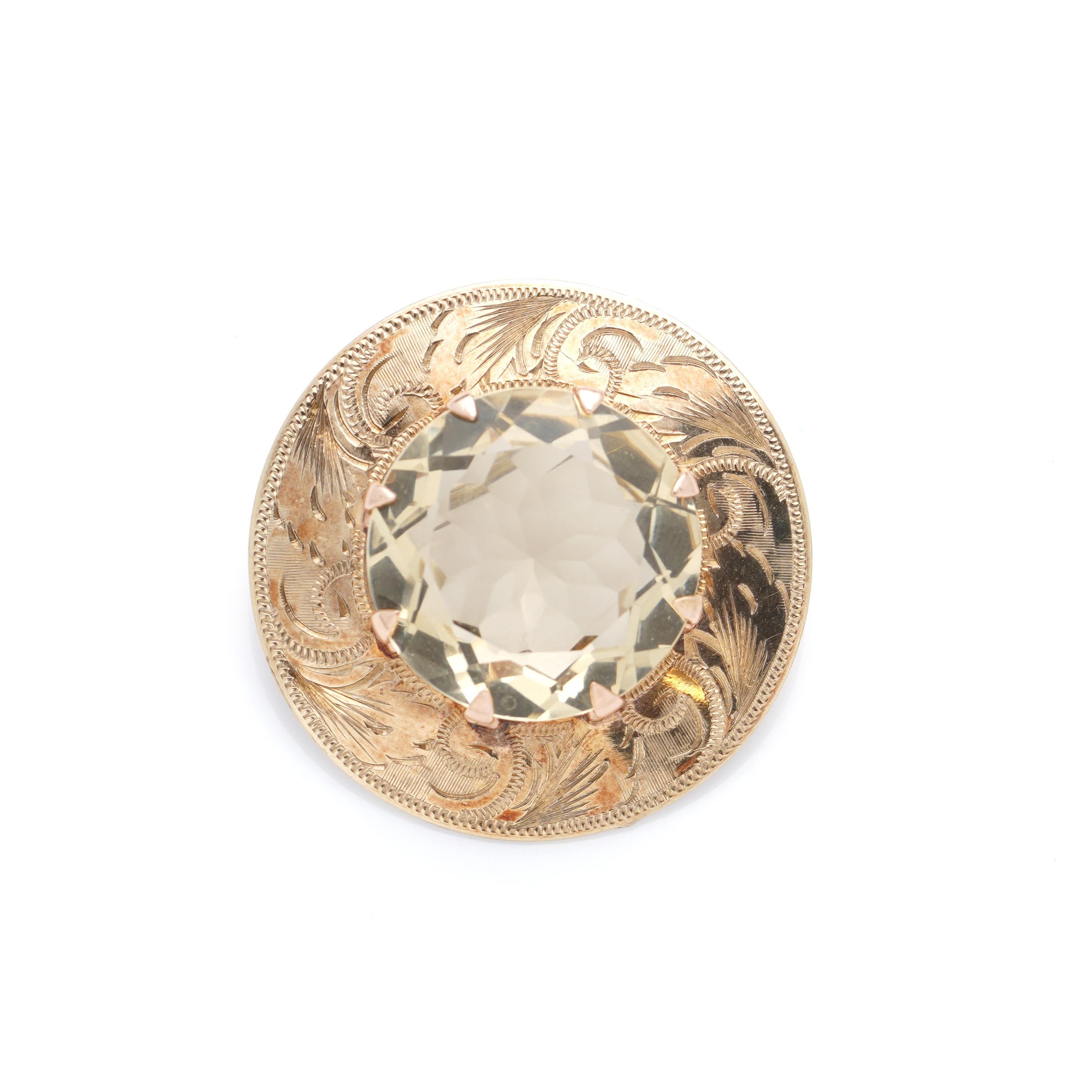 9KT Yellow Gold Scottish Brooch With Zircon Stone
Maker: WBS
Made in Scotland, 1965
Fully Hallmarked 9KT GOLD

Dimensions - 
Diameter x Depth: 3.4 x 1.5 cm
Weight: 10.19 grams

Zircon Stone: 31 Carats Approximately.

Condition: Pre-owned, great
