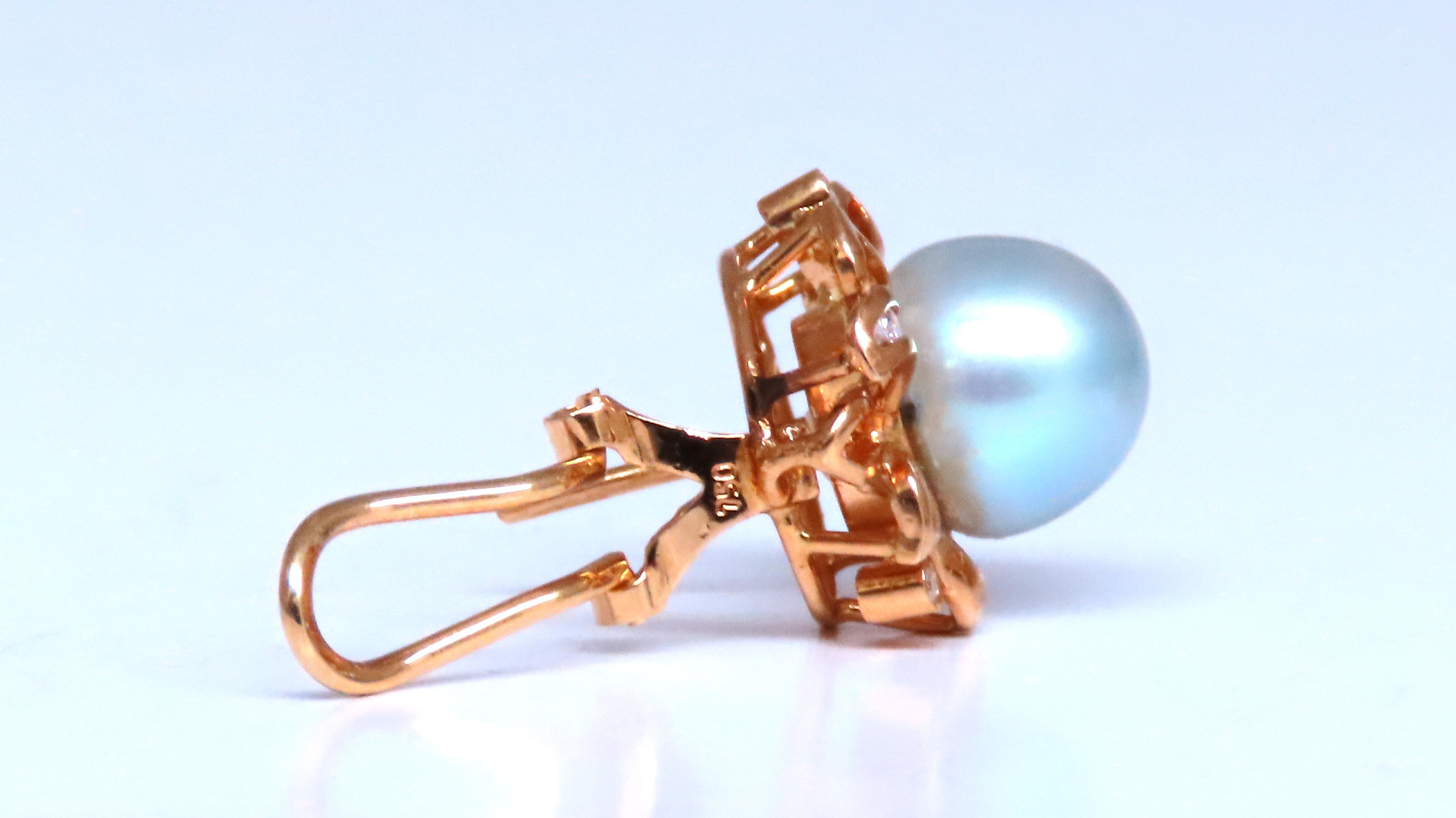 Orecchini di perle del mare del sud da 9 mm 
Patina della cornice gesso 
0,20 carati di diamanti naturali di colore h vs-2 chiarezza
Orecchini larghi 16 mm 
Oro giallo 18kt 9,4 grammi