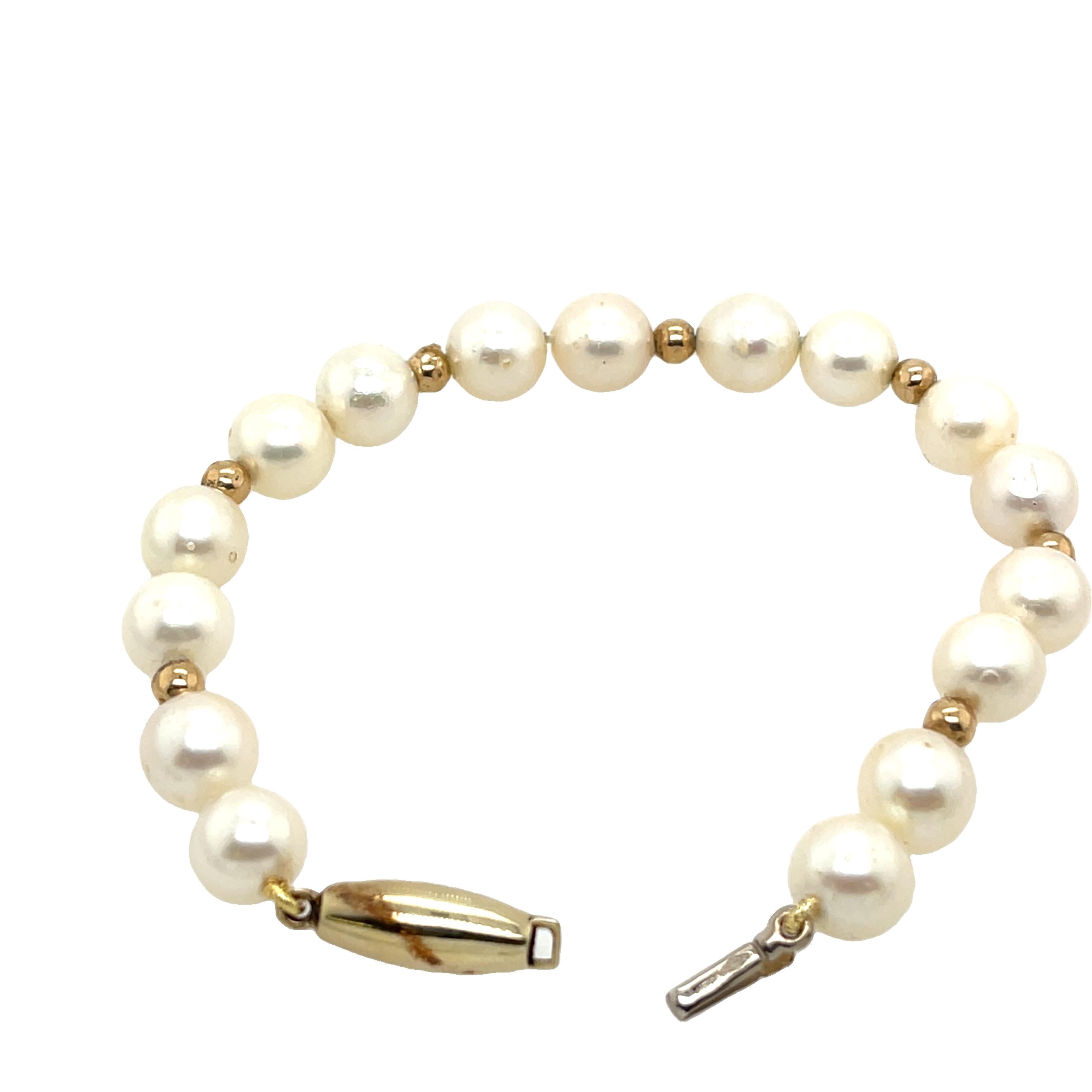 Elegant and timeless, this bracelet features lustrous 9mm matching freshwater pearls strung on silk thread and finished with a secure 9ct yellow gold clasp. 
The perfect piece for weddings, anniversaries, or everyday sophistication.

Total Weight: