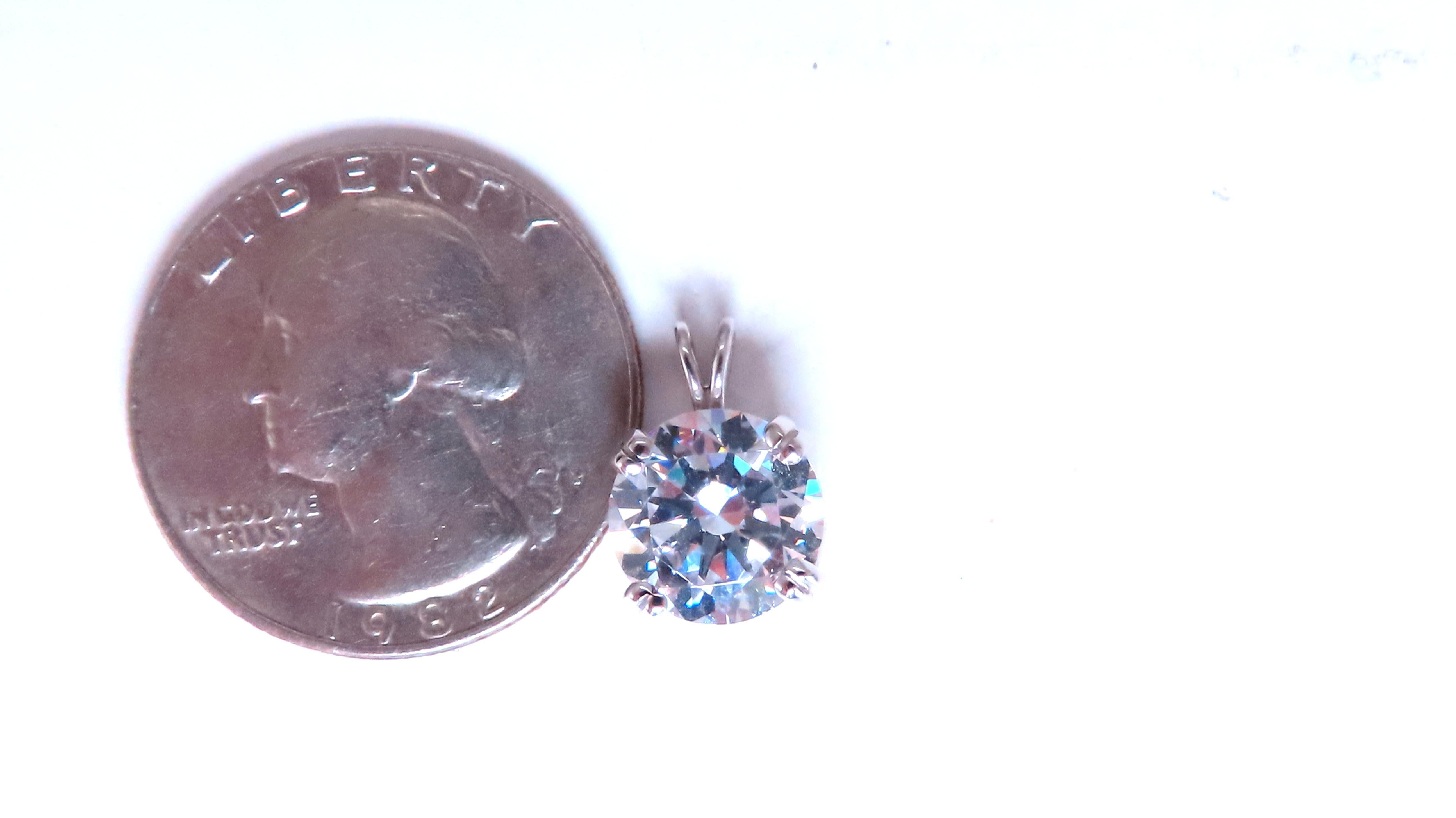 9mm Bright White Stone Solitaire Pendant
Will fit 3mm Chain.
14kt white gold 2.5 grams