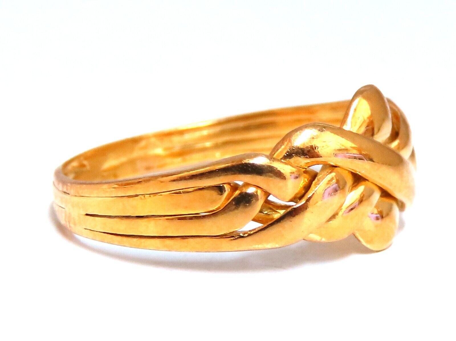 Retro, neoclassical interlink braid band

9mm Wide Gold Band.

Size 8.5

3.4 Grams. / 18Kt yellow gold

Depth: 2mm