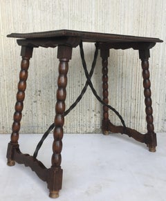 Spanish Baroque Side Table with Iron Stretcher and Carved Top in Walnut