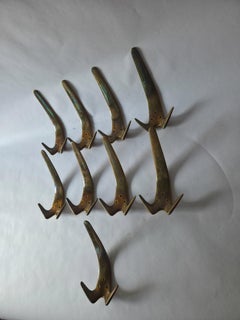 9x Carl Auböck Modelo #4056 Ganchos de pared de latón Años 50