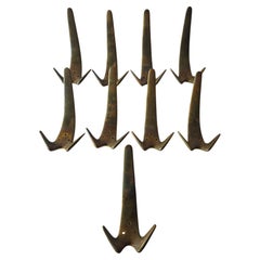 9x Carl Auböck Modelo #4056 Ganchos de pared de latón Años 50