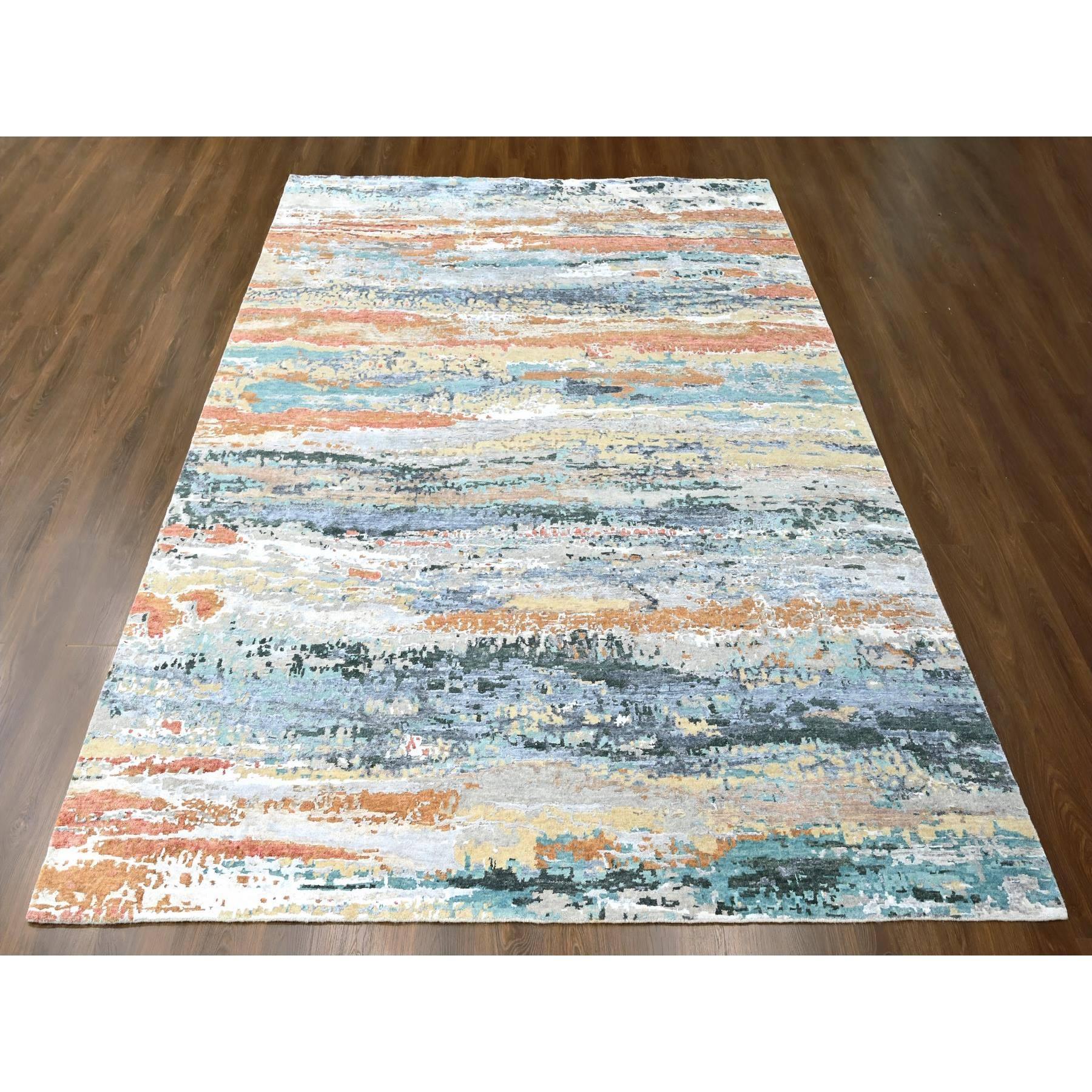 Seaweed Green, Diagonal Abstract with Wavy and Colorful Design, Wool and Plant Based Silk, Hand Knotted, Nepali Weave, Modern, Oriental Rug
Primary materials: Wool & Silk
Latex: No Pile 
height: 0.25 Inches
Style: Contemporary
Primary color: