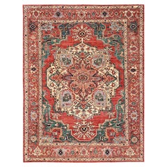 Tapis Serapi Heriz rouge corail, 2,74 m x 3,53 m, motif médaillon, noué à la main, 100 % laine