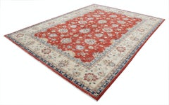 9x11.7 ft Hand Knotted Floral Large Area Rug with Red Field and Beige Border.