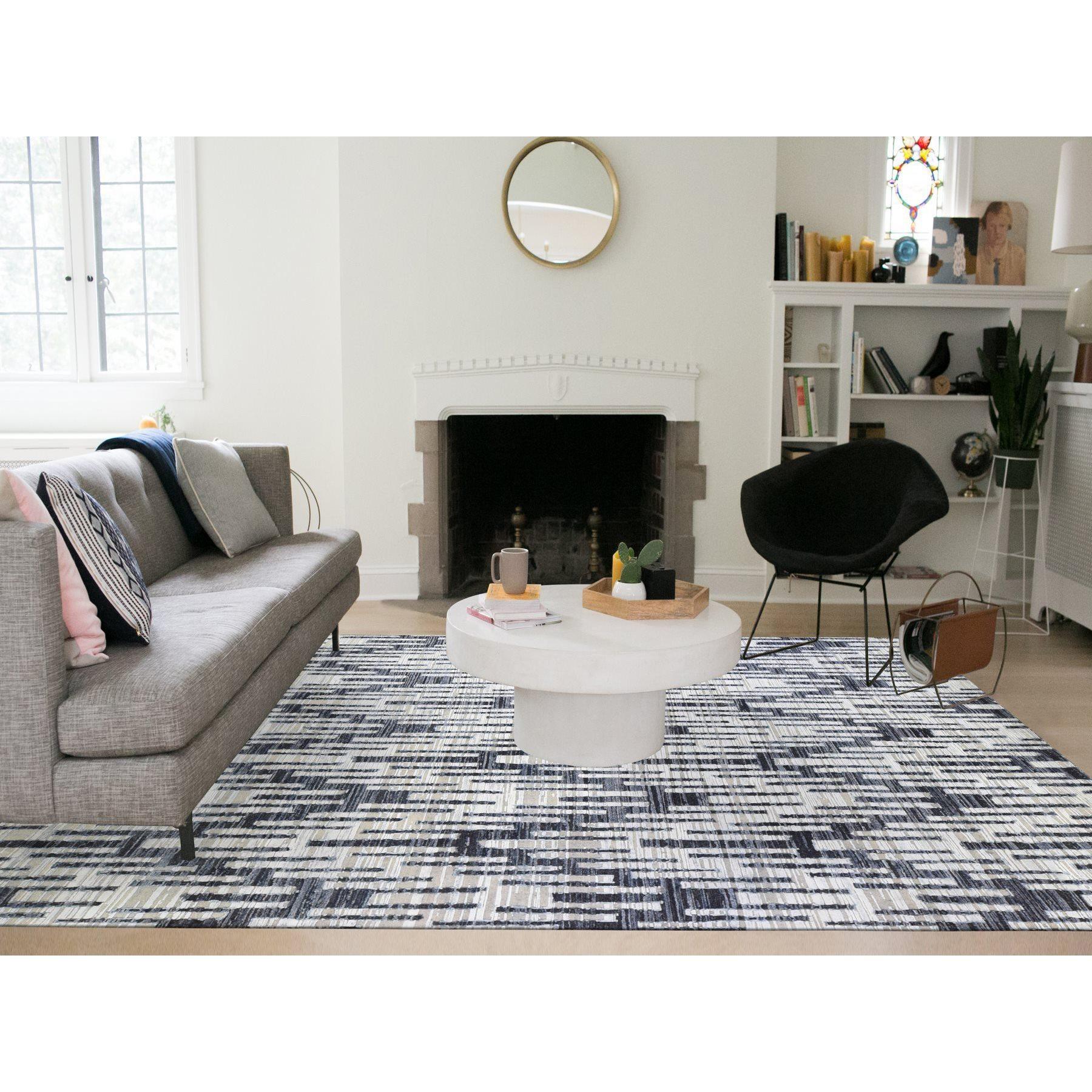 This is a truly genuine one-of-a-kind Black and White Zig Zag Design Pure Silk and Textured Wool Oriental Rug. It has been Knotted for months and months in the centuries-old weaving craftsmanship techniques by expert artisans.
Primary materials:
