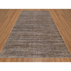 Tappeto da esterno per interni con struttura variegata marrone e design moderno, lavorato a mano