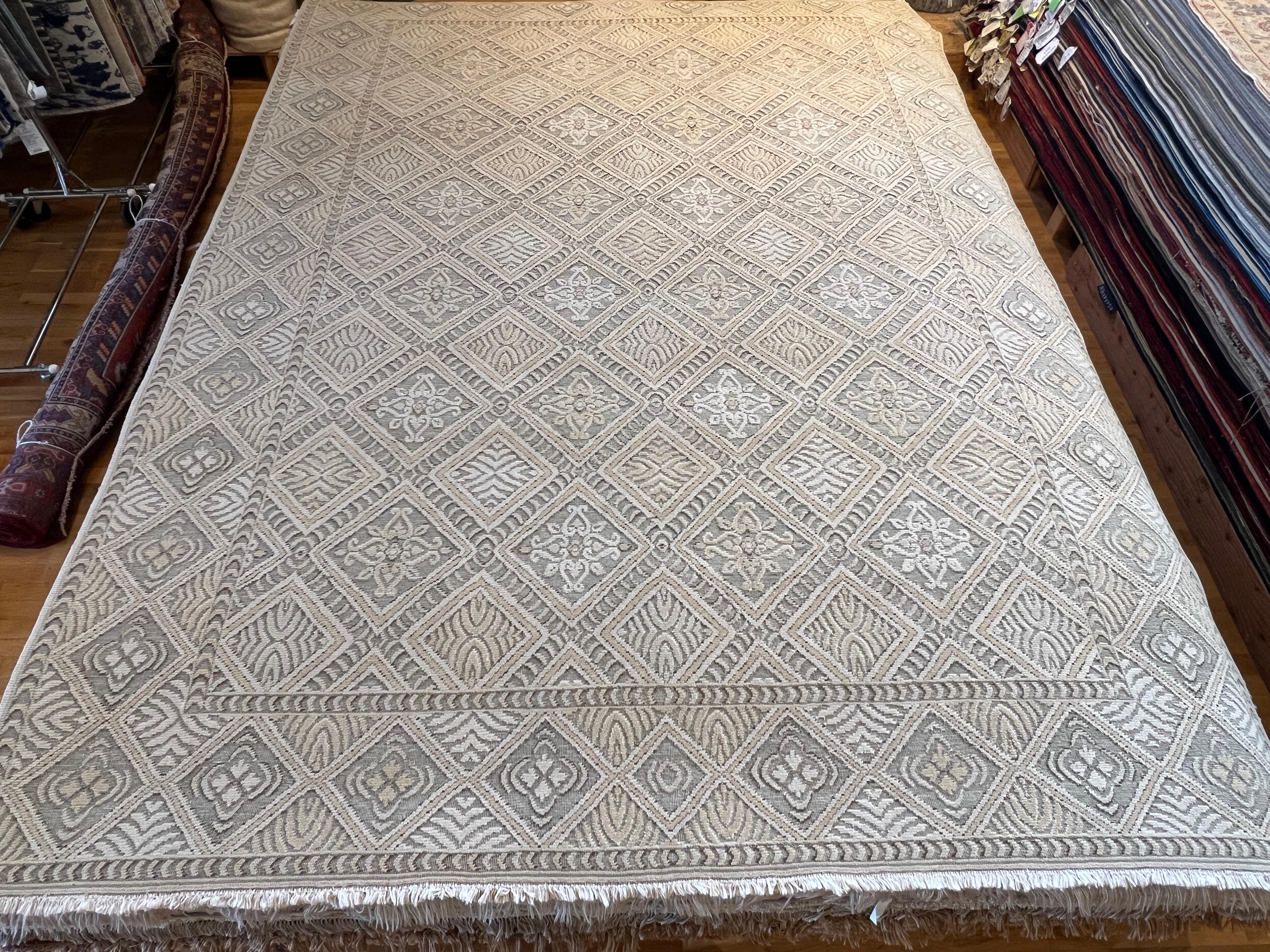 Discover our exquisite Hand-Knotted Wool Rug, blending timeless French floral design with modern sophistication. Meticulously crafted by skilled artisans, each rug features a delicate geometric pattern in neutral tones, hand-knotted from premium