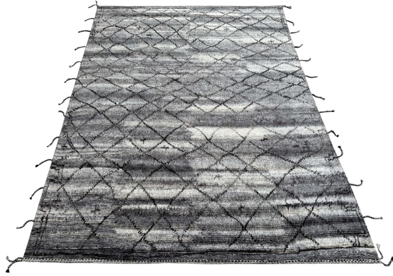 Artisanal Craft Meets Modern Design — Made Just for You

Introduce warmth, texture, and timeless style to your space with our new contemporary hand-knotted Moroccan berber design area rug, crafted from 100% natural wool. This rug brings together the